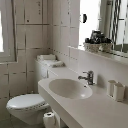 ホテル Grichting & Serviced